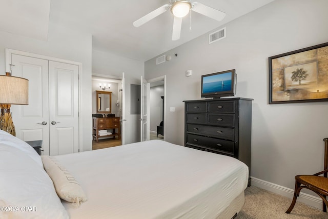 bedroom featuring a closet, ceiling fan, and carpet