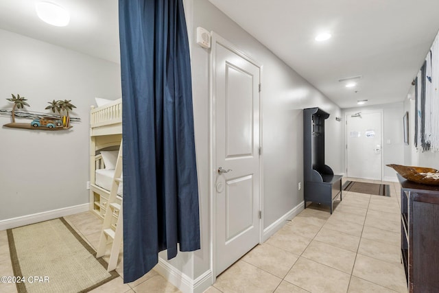 bedroom with a water view, ceiling fan, and access to outside