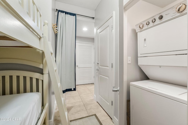 bathroom featuring tile flooring, vanity, and a shower with door