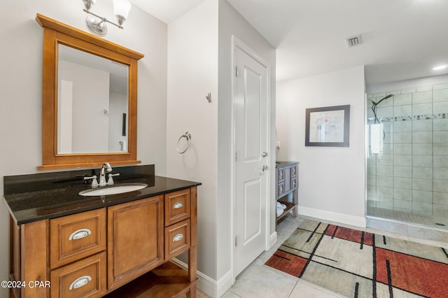 bathroom featuring ceiling fan and vanity