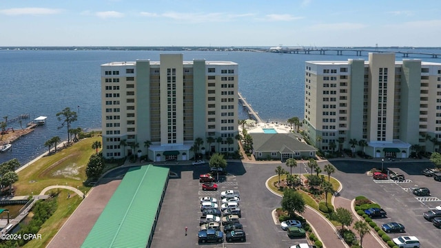 birds eye view of property with a water view