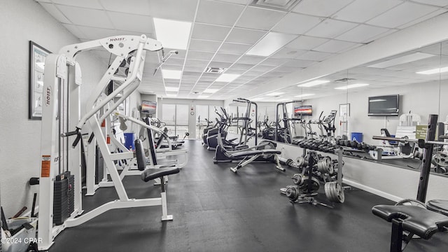 gym with a drop ceiling