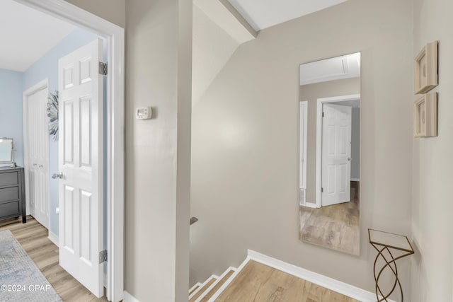 corridor featuring light wood-type flooring