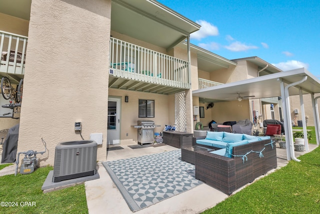 view of patio featuring a balcony, area for grilling, an outdoor hangout area, central AC unit, and ceiling fan