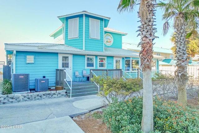 view of front of property featuring cooling unit