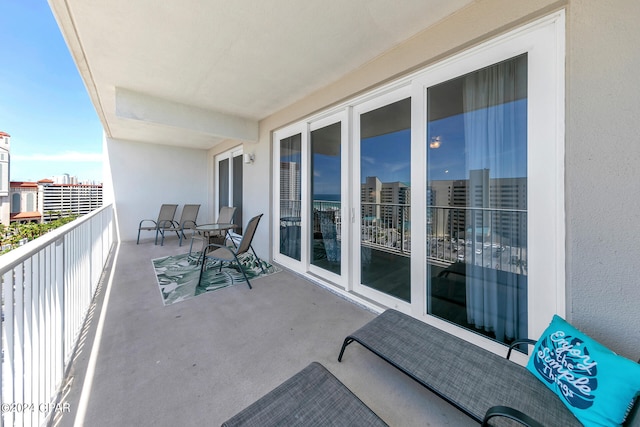 balcony featuring a city view