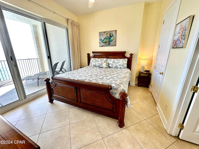 tiled bedroom featuring access to exterior