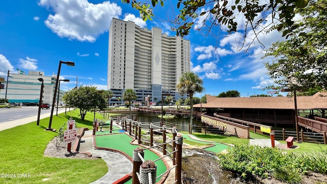 view of property's community with a water view