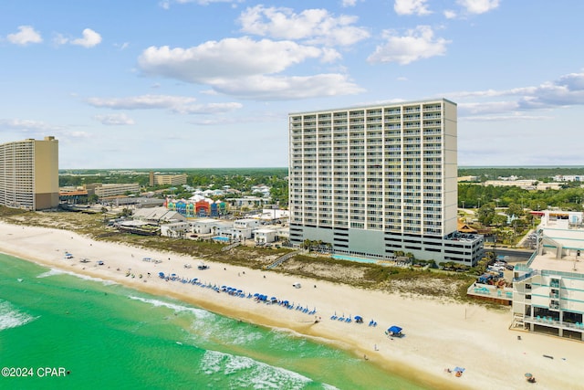 aerial view featuring a water view and a beach view