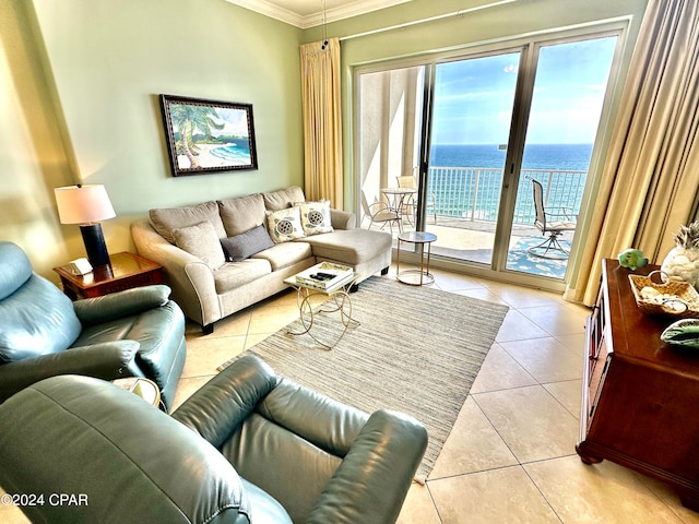 living room featuring tile flooring, a water view, and crown molding