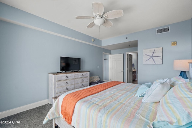 bedroom with carpet flooring, visible vents, ceiling fan, and baseboards