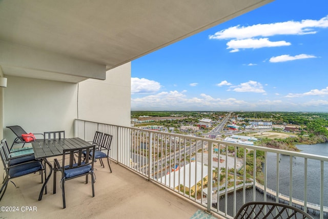 balcony featuring a water view