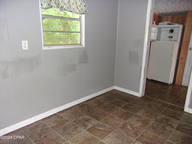 view of tiled spare room