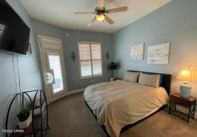 carpeted bedroom with access to exterior and ceiling fan