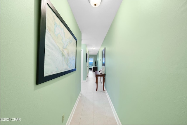 hallway featuring light tile patterned floors