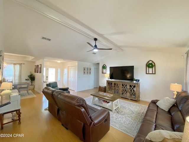 living room with vaulted ceiling with beams and ceiling fan