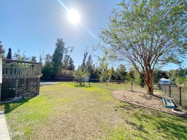 view of yard featuring a deck