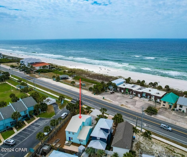 bird's eye view with a view of the beach and a water view