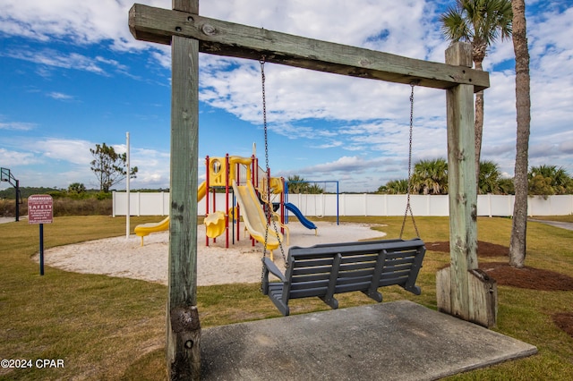 view of play area featuring a lawn