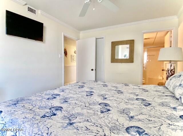 bedroom featuring ceiling fan, crown molding, and connected bathroom