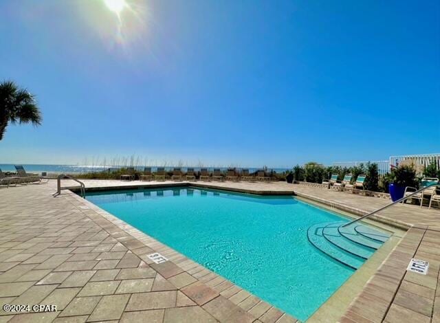 view of pool with a patio area