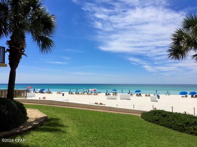 property view of water featuring a beach view