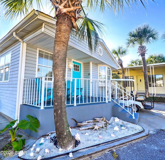 view of home's exterior featuring covered porch