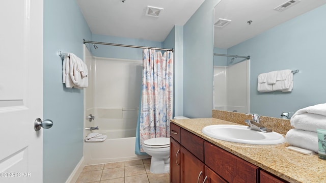 full bathroom featuring tile patterned flooring, vanity, toilet, and shower / bath combo