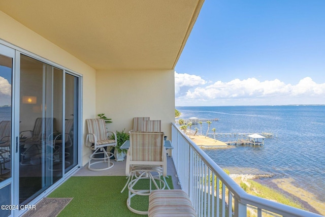 balcony featuring a water view