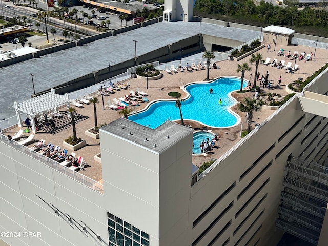 view of swimming pool with a patio area