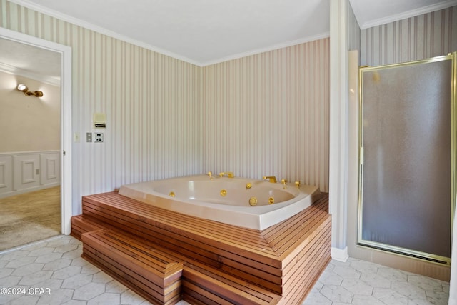 bathroom featuring tile flooring, ornamental molding, and shower with separate bathtub