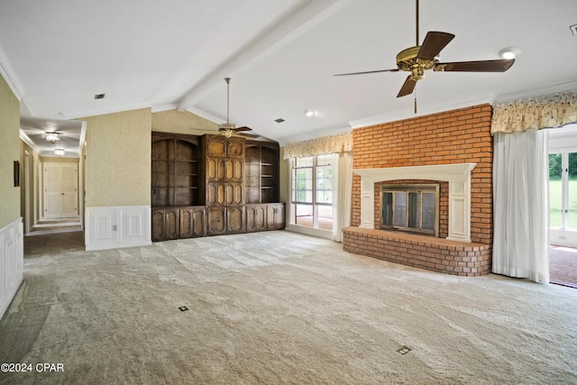 unfurnished living room with ceiling fan, a wealth of natural light, and carpet floors