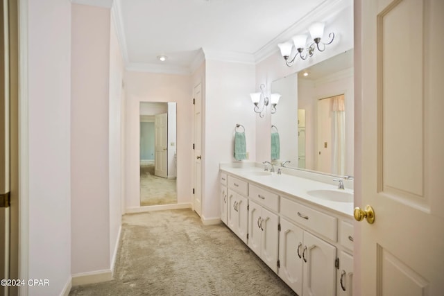 bathroom featuring crown molding and double vanity