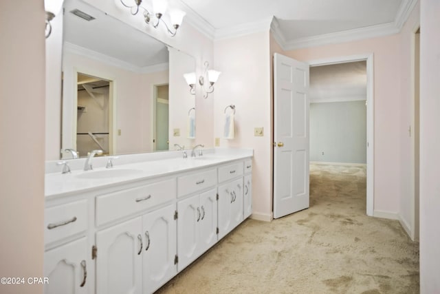 bathroom with vanity with extensive cabinet space, double sink, and crown molding