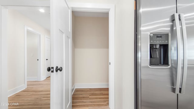 corridor featuring light hardwood / wood-style flooring