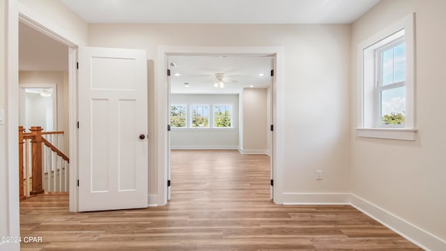 corridor featuring light hardwood / wood-style flooring