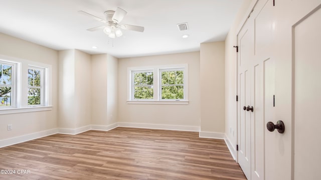 interior space featuring ceiling fan and light hardwood / wood-style flooring