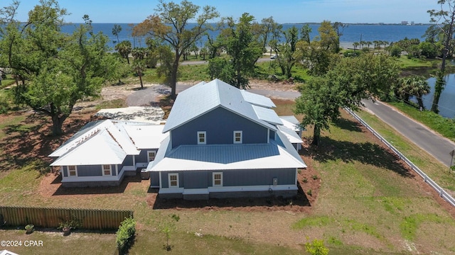 drone / aerial view with a water view