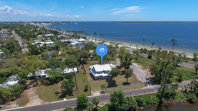 birds eye view of property featuring a water view