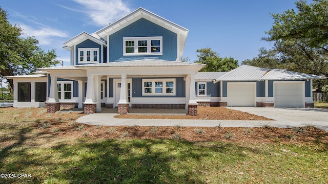 view of front of property with a front yard and a porch