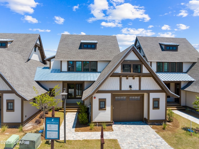 view of front of home featuring a garage