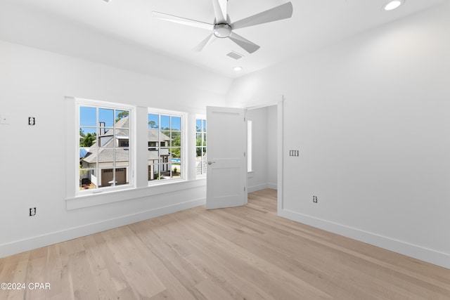 spare room featuring ceiling fan and light wood-type flooring