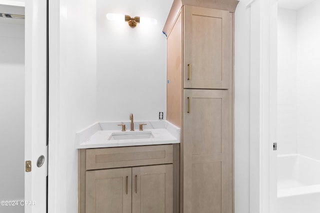 bathroom with bathtub / shower combination and vanity