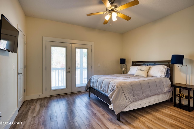 bedroom featuring hardwood / wood-style flooring, ceiling fan, access to outside, and french doors