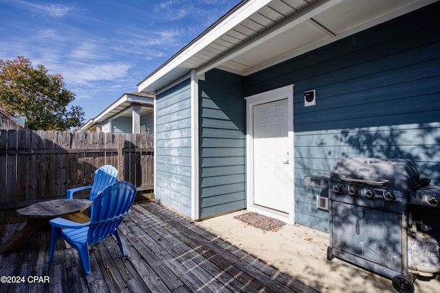 wooden deck with area for grilling