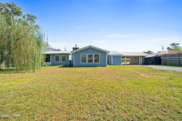 ranch-style home with a front yard