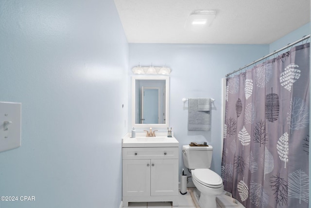 bathroom featuring vanity, toilet, tile patterned floors, and a shower with curtain