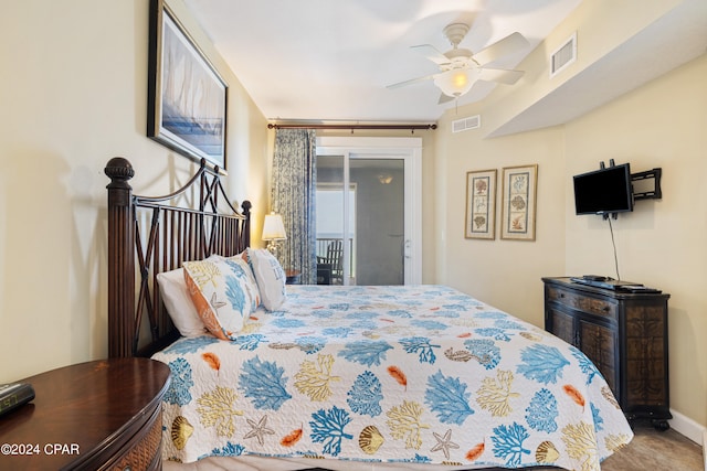 bedroom featuring ceiling fan and access to exterior