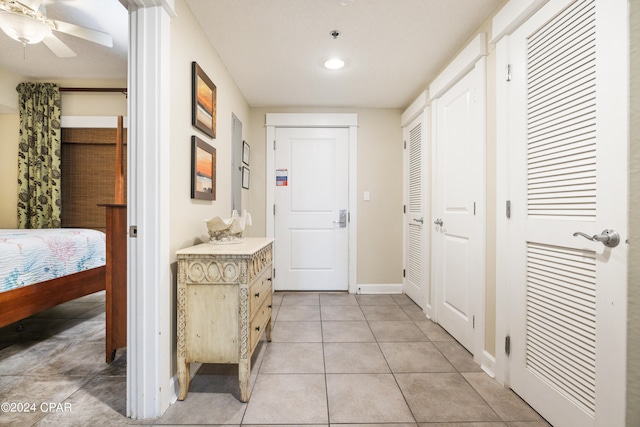 interior space featuring light tile floors