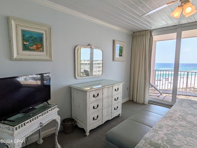 carpeted bedroom featuring a water view, a view of the beach, ceiling fan, access to exterior, and wood ceiling